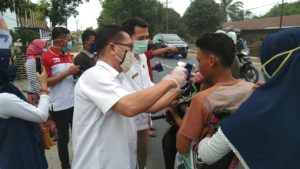 Dampak Covid-19, DPC Partai Gerindra Sergai Bagikan Masker Dan Sembako Kepada Masyarakat