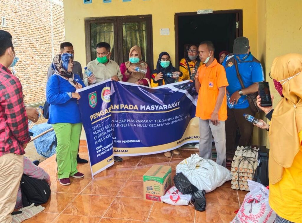 BEM FKIP UNA Bantu Korban Banjir di Desa Simpang Empat, Asahan