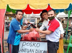 JNE Salurkan Bantuan Bagi Korban Banjir di Medan