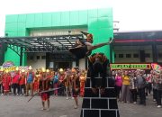 “Hombo Batu” Warnai Peringatan Dies Natalis UKM Nias USM Indonesia Ke-10