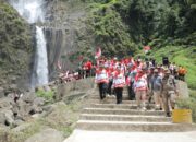 Jelang HUT RI Ke – 79, Pemkab Asahan Gelar Pengibaran Bendera di Wisata Alam Air Terjun Ponot